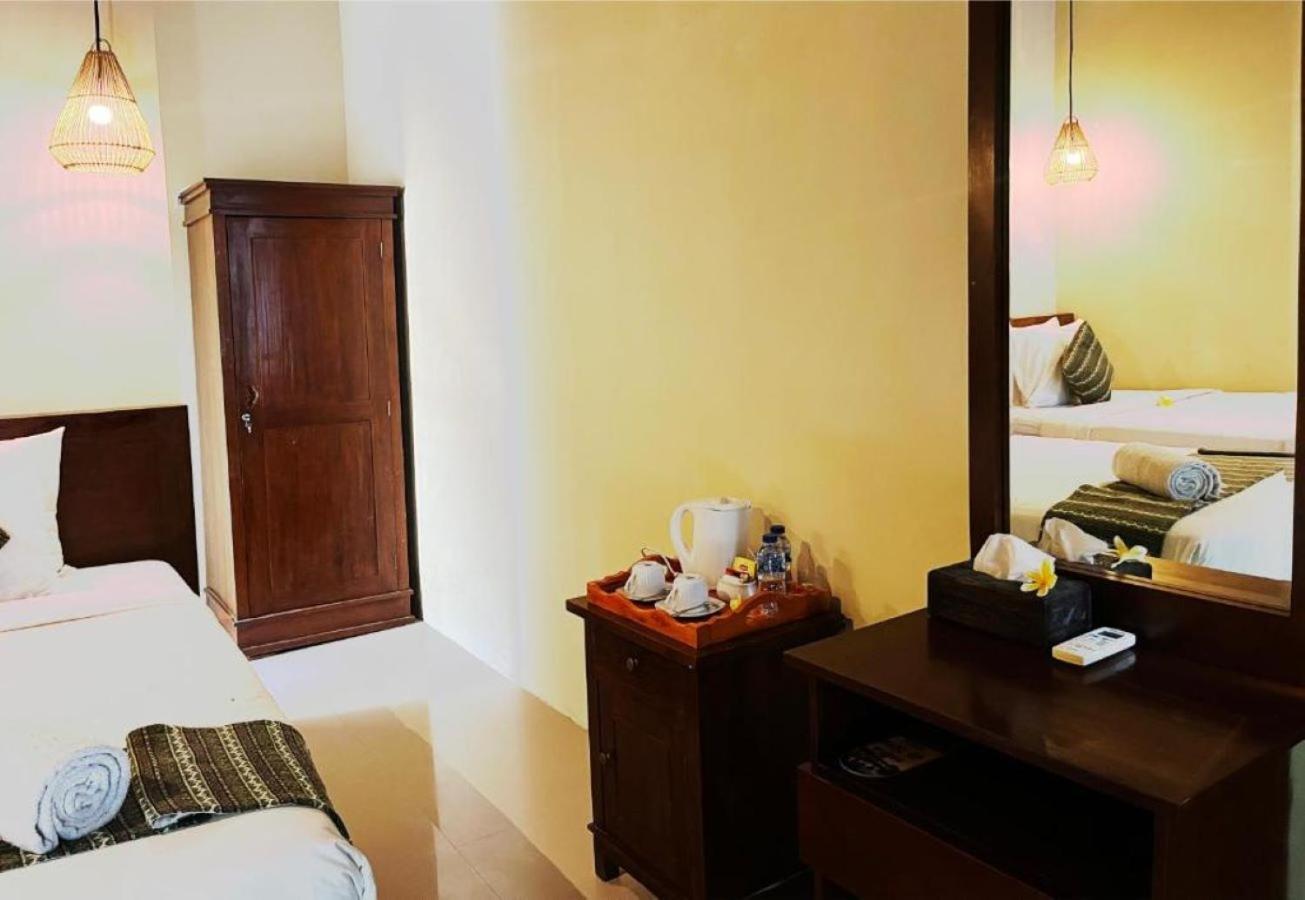 Wk Gamat Garden Hotel Toyapakeh Exterior photo