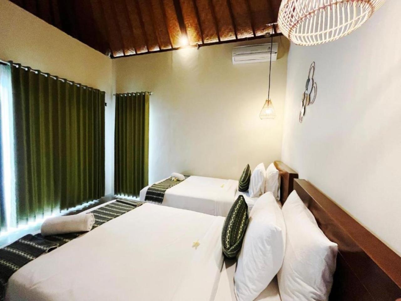 Wk Gamat Garden Hotel Toyapakeh Exterior photo