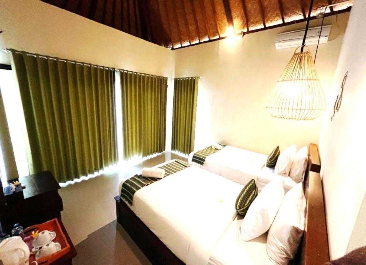 Wk Gamat Garden Hotel Toyapakeh Exterior photo